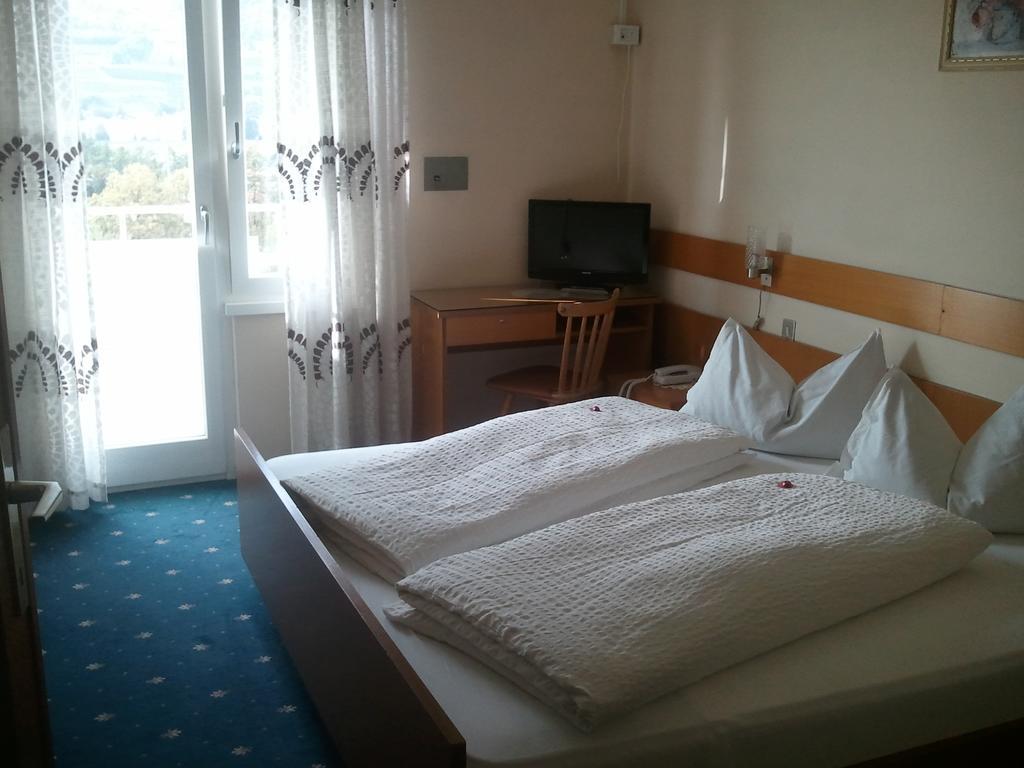 Hotel Lux Merano Pokoj fotografie
