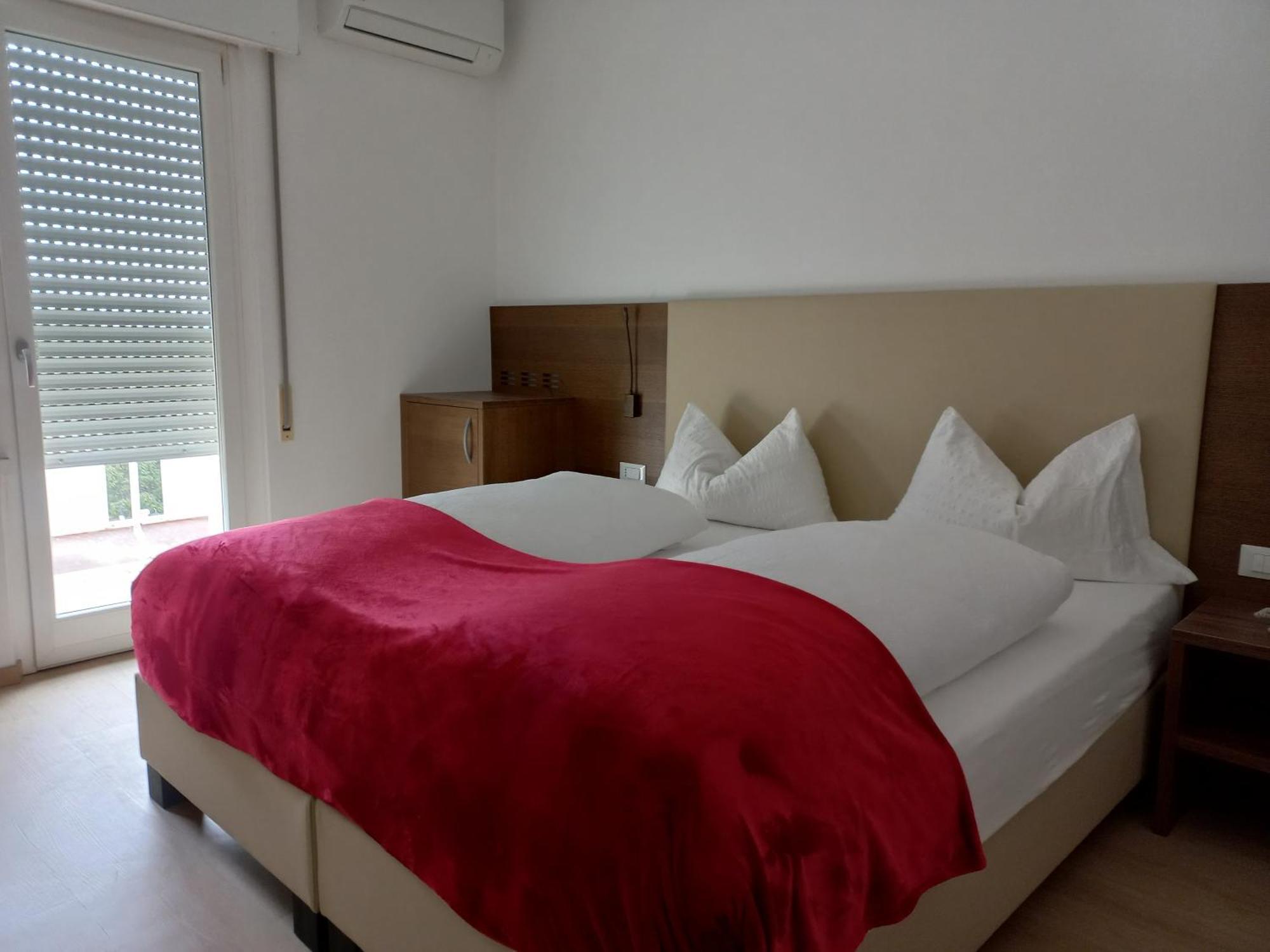 Hotel Lux Merano Pokoj fotografie