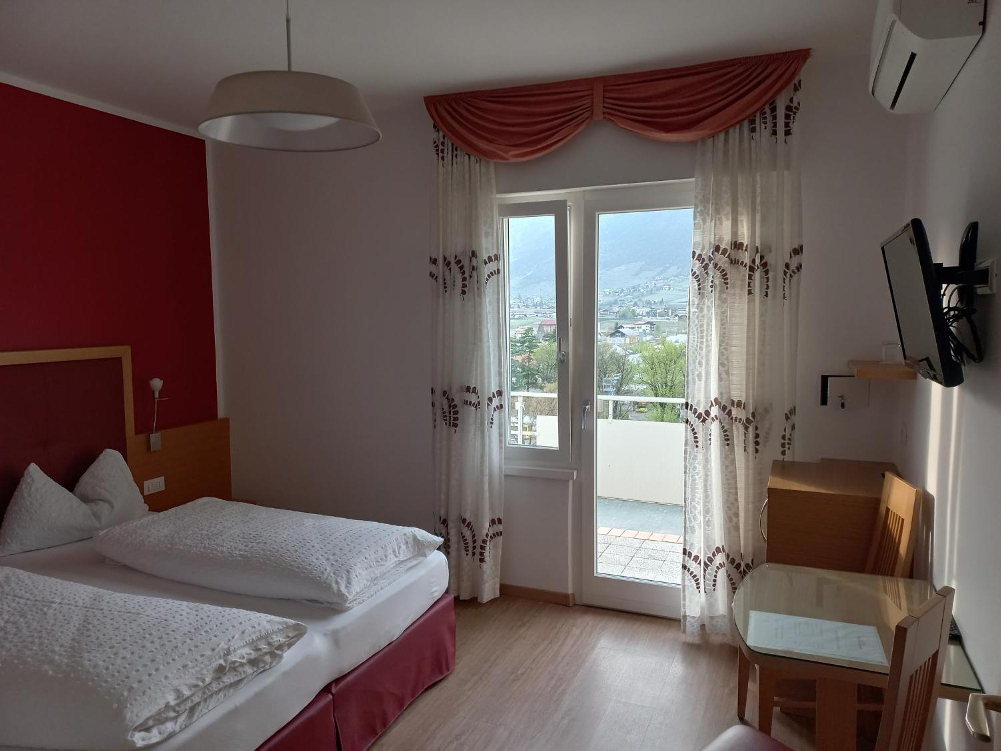 Hotel Lux Merano Pokoj fotografie