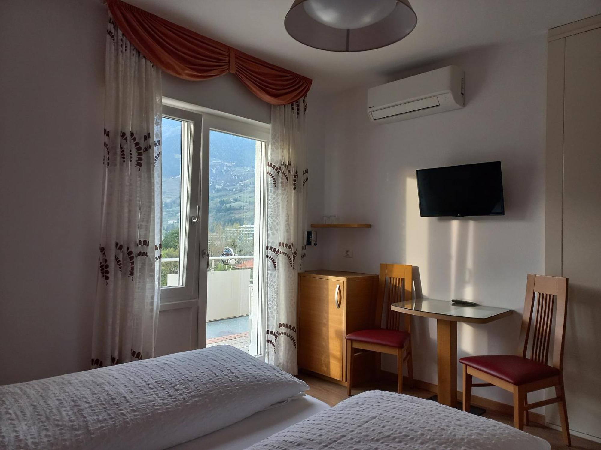 Hotel Lux Merano Pokoj fotografie